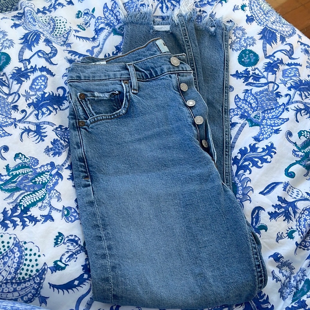 Agolde skinny jeans with frayed bottoms